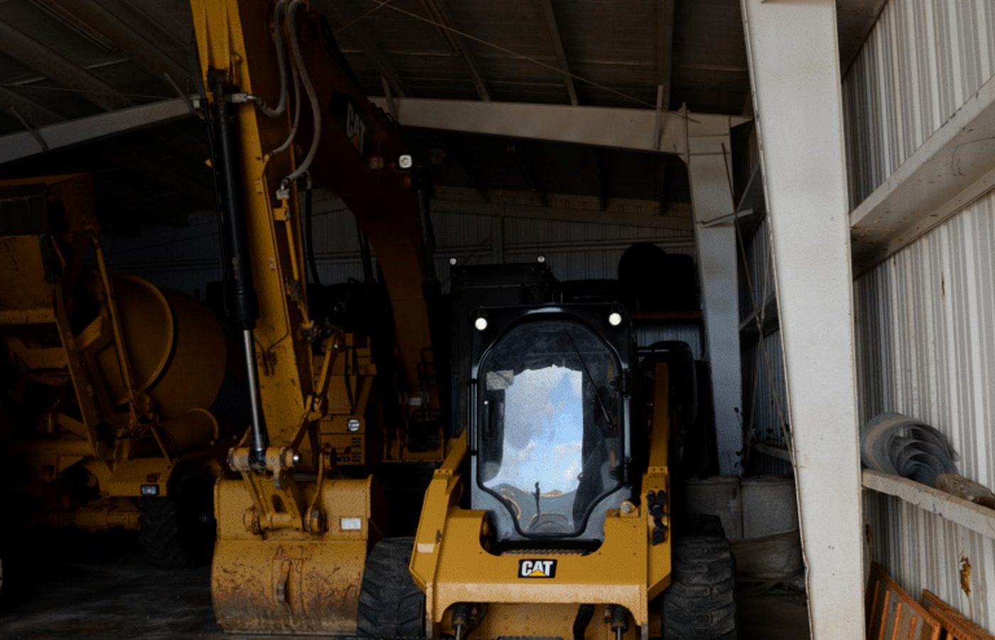 Skid steer loader used for concrete construction and material handling